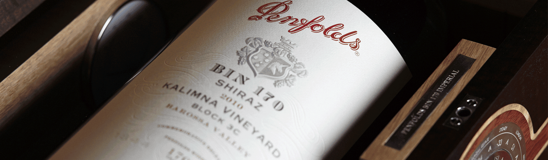 Close up of Bin 170 bottle in gift box. Compass is visible on gift box closure