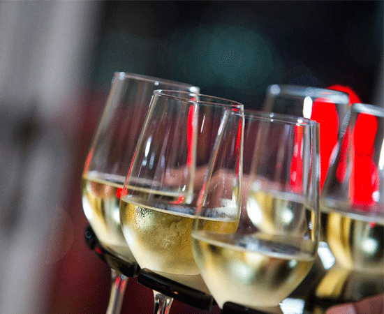 A tray of chilled white wines