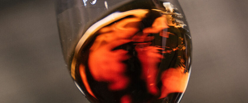 A closeup photograph of Penfolds tawny served in a glass.