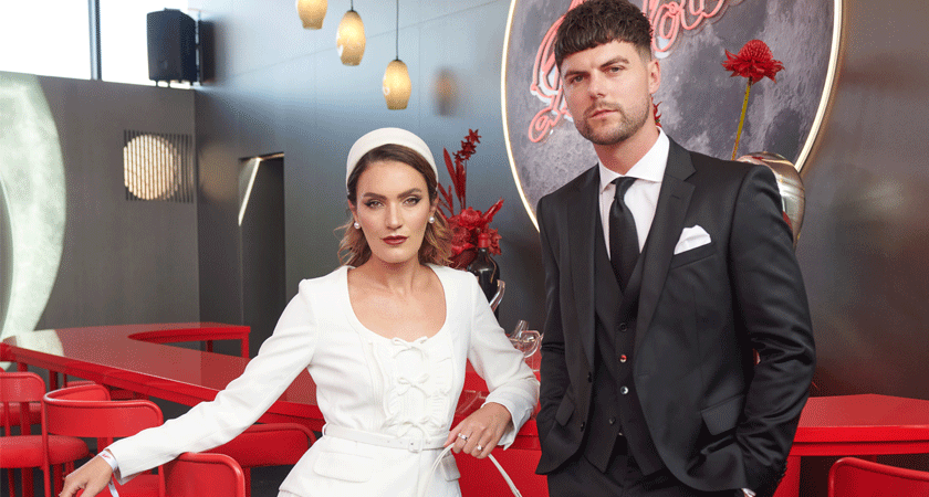 Holly T and Shaun Lyle pose in the marquee