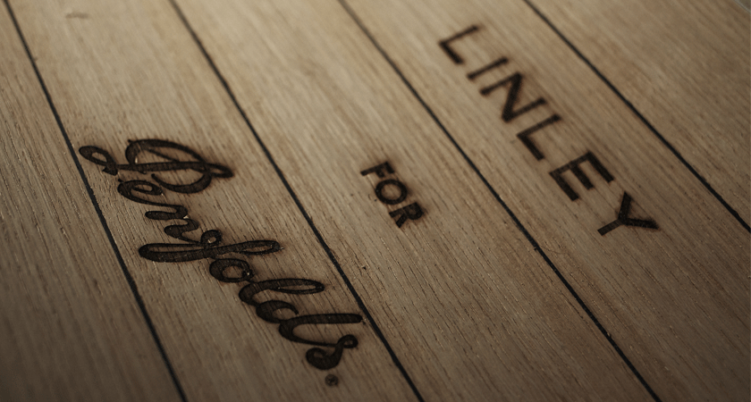 Linley for Penfolds debossed on wood panel