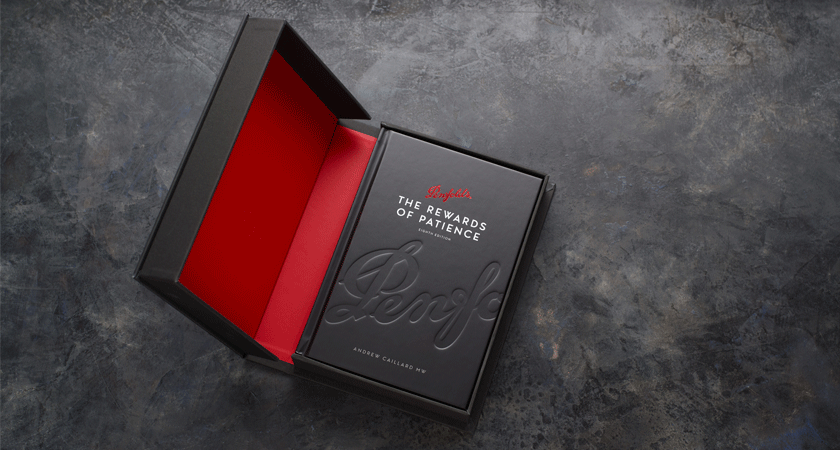 Rewards of Patience edition 8 cover.  Black matte hardback finish with debossed Penfolds logo