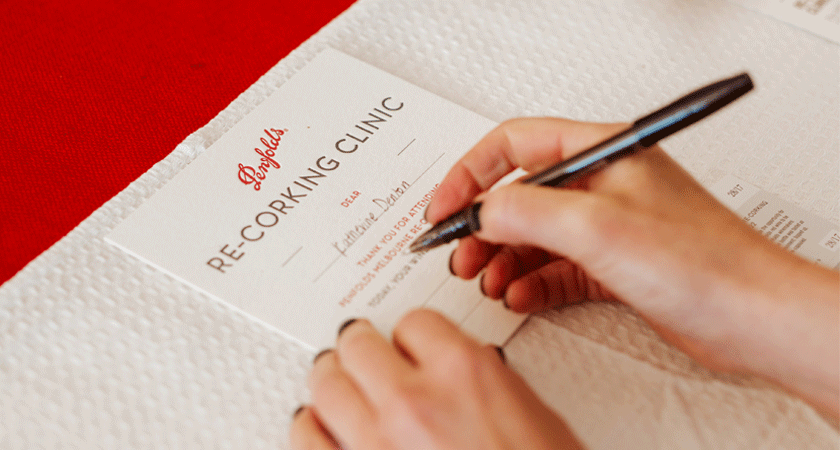 Winemaker signs re-corking clinic certificate 