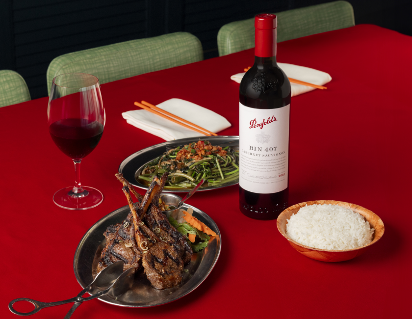 Penfolds Bin 407 alongside meat, rice and vegetables.