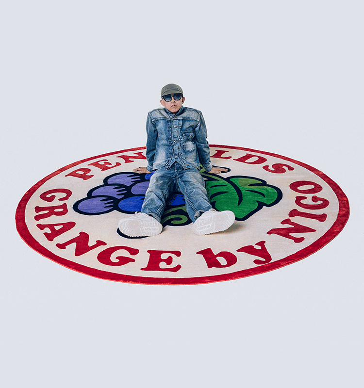 NIGO on sitting on Limited Edition Grange NIGO Silk Rug