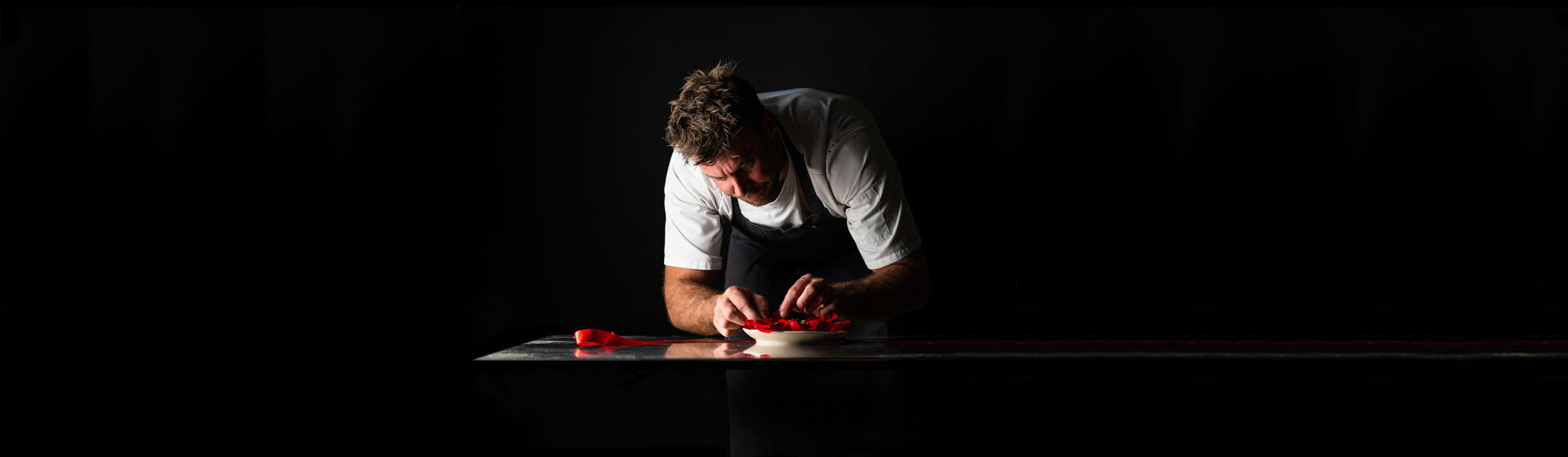 Executive Chef Scott Huggins plating up at Magill Estate Restaurant